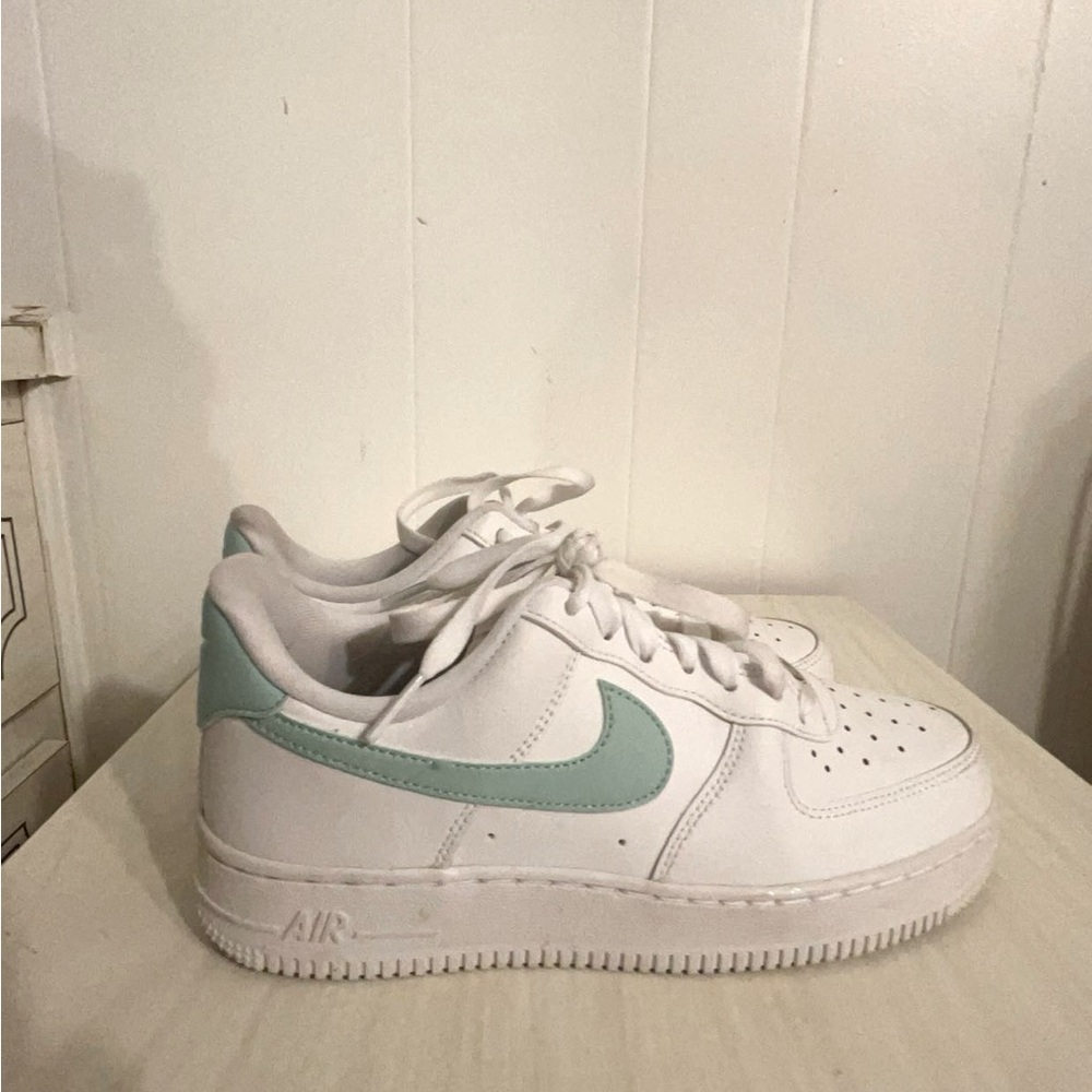 Nike white Air Force 1’s with mint green Nike swoosh